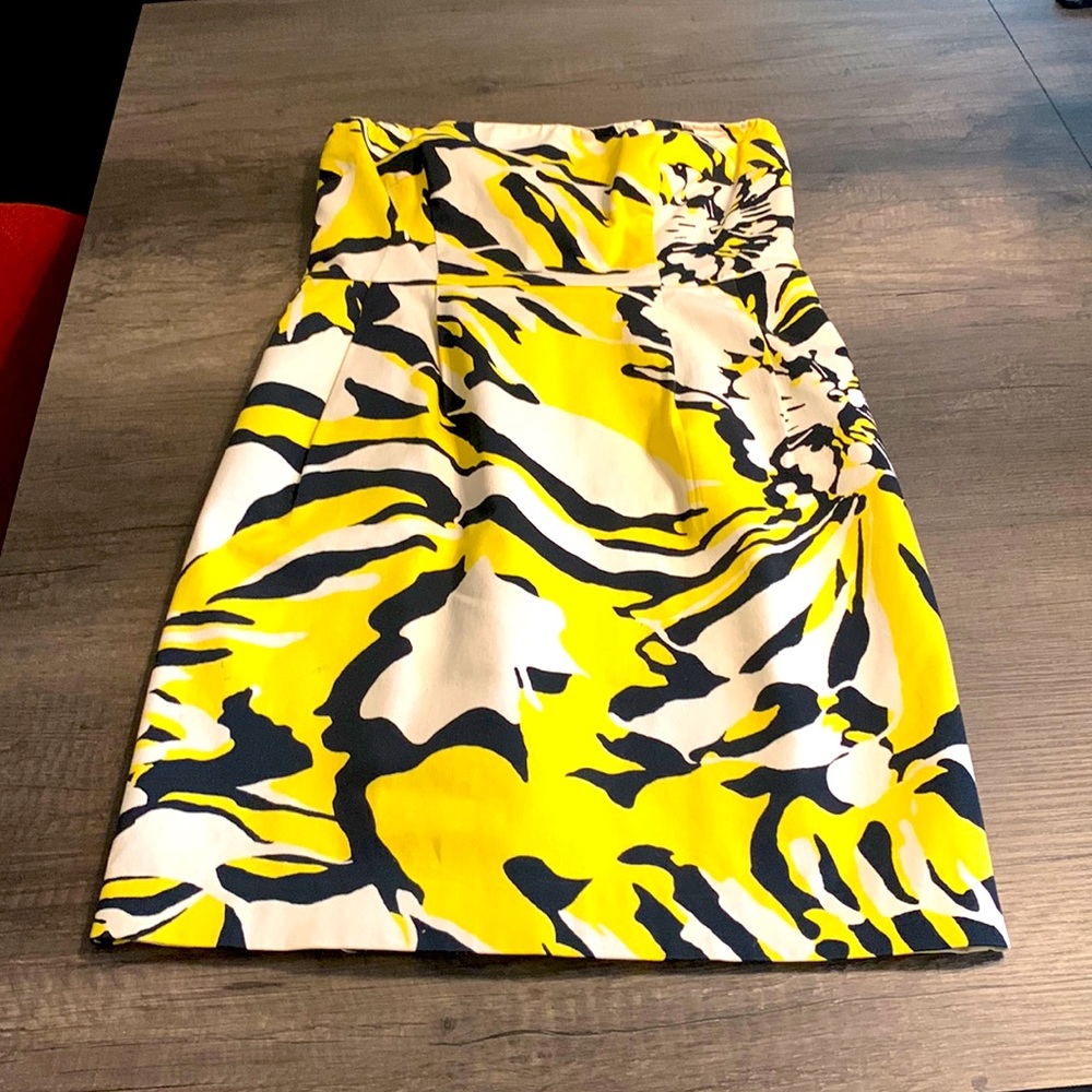 Express yellow and black strapless mini dress